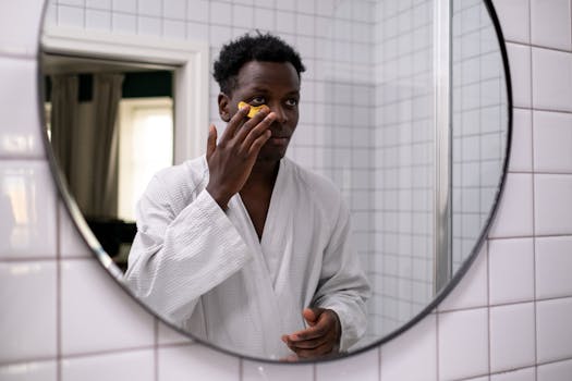 men applying skincare products