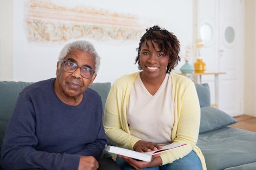 elderly man reading a book with a smile