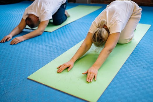 senior man enjoying a yoga class