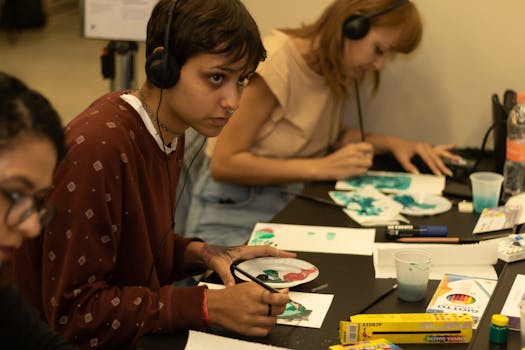 a group of seniors enjoying a painting class