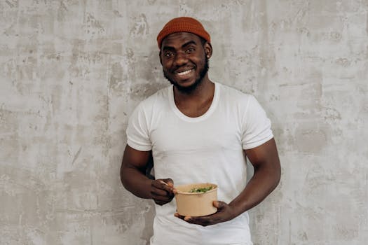 man enjoying a healthy meal with friends